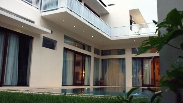 Pasific Beach Cottages Mangsit Rum bild